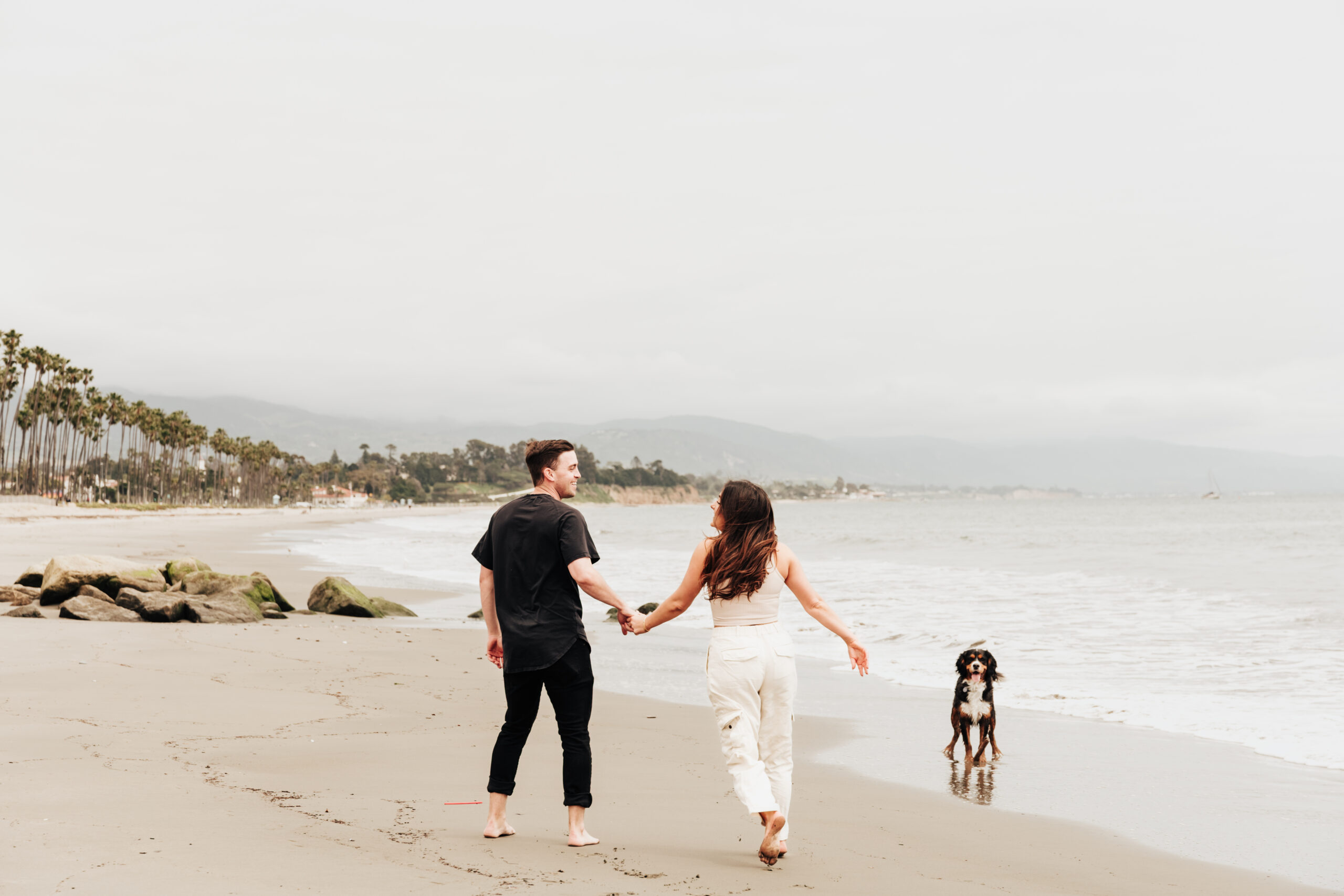 couples beach session with dog in santa barbara ca